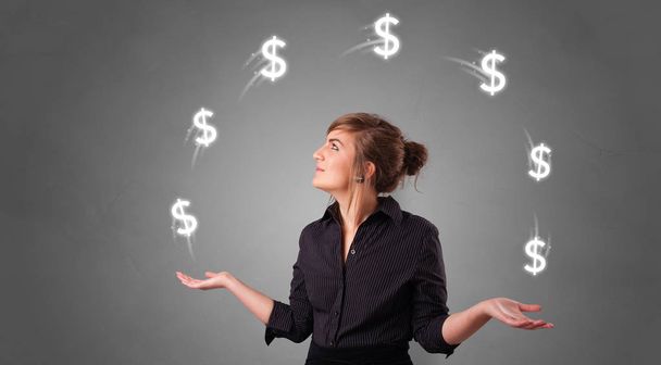 Person juggle with dollar symbol - Photo, Image