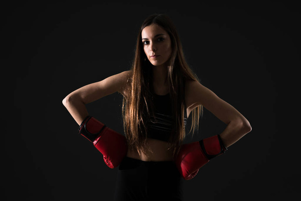 Young sport woman with boxing gloves - Foto, immagini