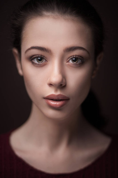 young woman with clean skin on black background - Valokuva, kuva