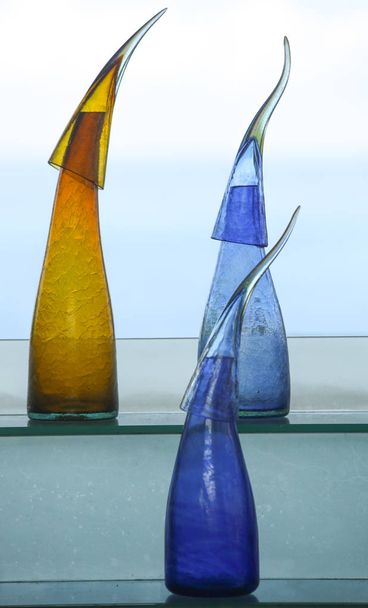 Decorative colorful bottles in the bar - Photo, Image
