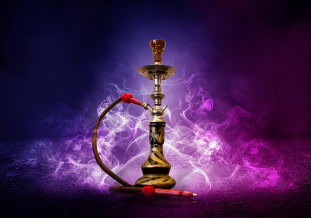 Hookah smoking on a background of abstract futuristic background, neon light, smoke. - Foto, Imagen