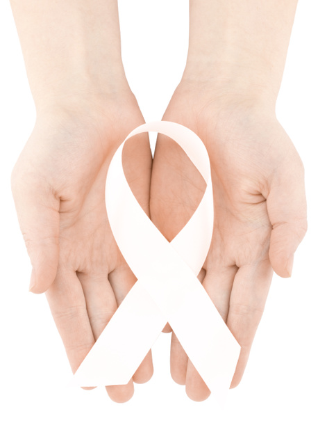 healthcare and medicine concept - womans hands holding white ribbon. - Photo, Image