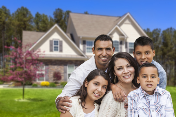 Hispanic Family in Front of Beautiful House - Photo, Image