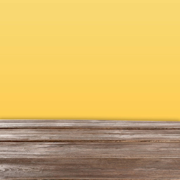 Empty wooden table on colorful background. Mockup for design - Photo, Image