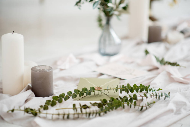 wedding decor, flowers, black and gold decor, candles. Wedding table setting, yellow flowers, eucalyptus leaves, fine art - Fotografie, Obrázek