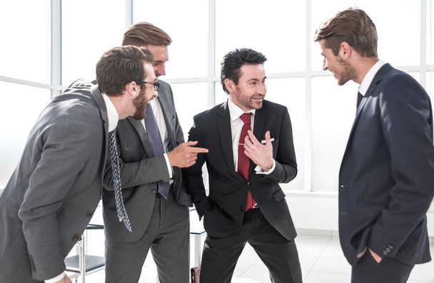 business team communicates standing in the office - 写真・画像