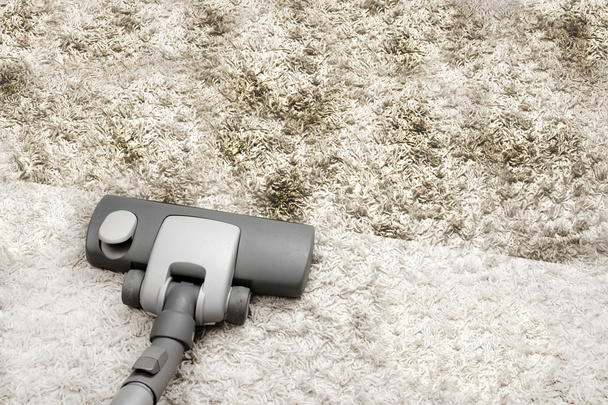 Vacuuming very dirty carpet - Foto, Bild