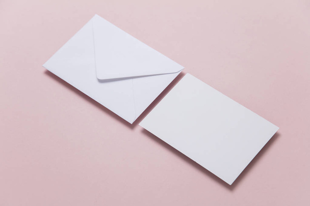 Blank white card with paper envelope template mock up - Фото, зображення