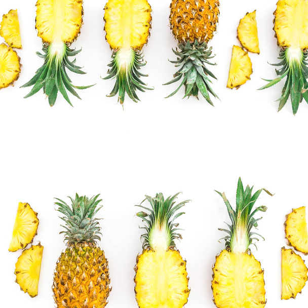 Food frame with juicy pineapple fruits on white background. Flat lay, top view. Food concept. - Photo, Image