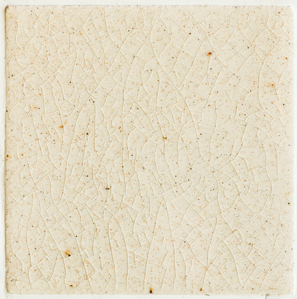 primer plano fondo y textura de las estrías agrietadas en azulejo esmaltado crema blanca - Foto, imagen