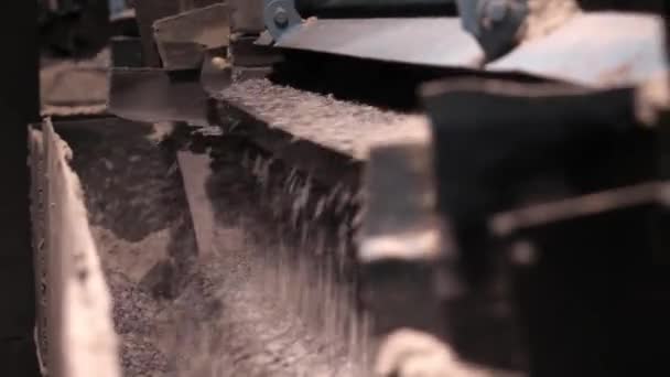 Stone crushing plant. Side view of process of crushing automatic installation of selecting and crushing and stones at mining enterprise - Footage, Video