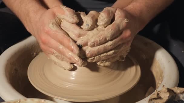 couple hands making clay jug on potters wheel - Footage, Video