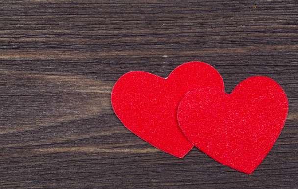 Two paper hearts on a wooden table on Valentine's Day - Photo, image
