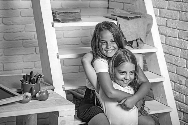 Portrait of smiling little school kids at school. - Photo, image
