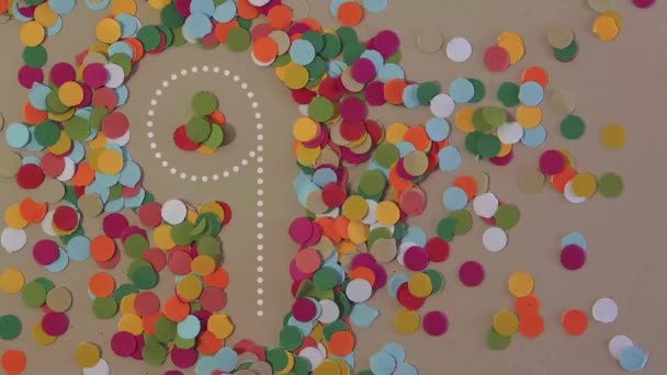 Confetti Número Nueve Antecedentes
 - Metraje, vídeo