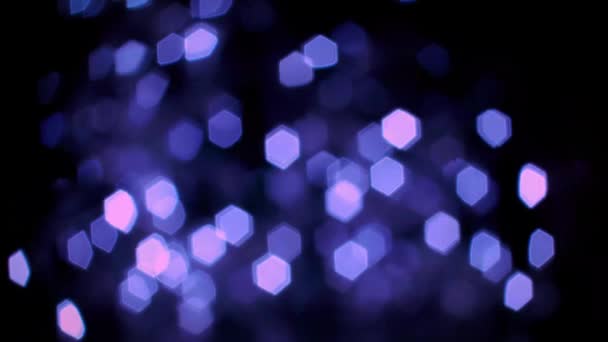 Luces de Bokeh hexagonal púrpura - Metraje, vídeo