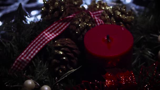 Woman Lighting A Red Christmas Candle - Кадри, відео