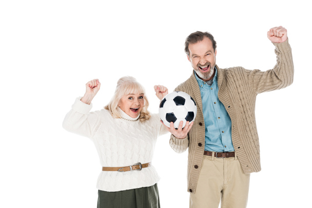 happy senior man holding football and smiling with cheerful wife isolated on white - Photo, Image