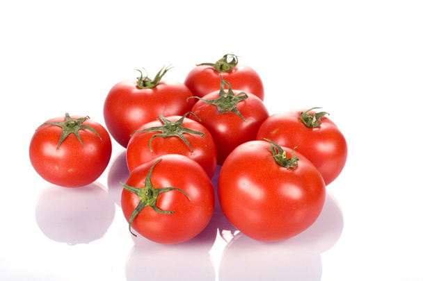 Повредить свежие красные влажные помидоры
 - Фото, изображение