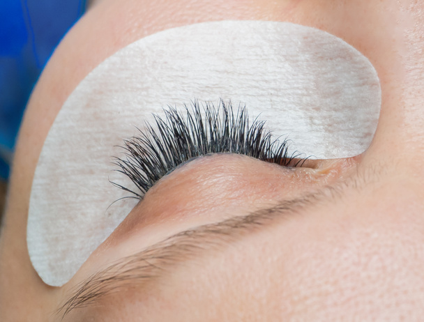 Eyelashes after the procedure of extension.  - Фото, изображение
