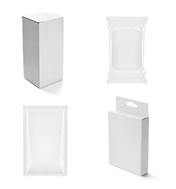 colección de varias cajas blancas y paquetes sobre fondo blanco. cada uno se dispara por separado
 - Foto, Imagen