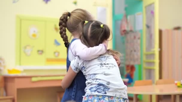 preschool education - happy children in kindergarten have fun playing together - Footage, Video