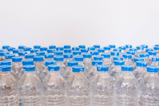 Rows of water plastic bottles and cap seal NSF us standard - Photo, Image