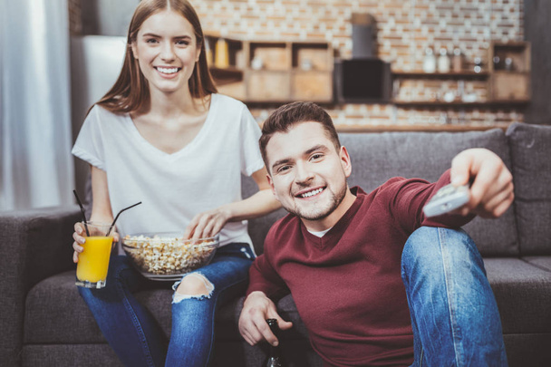 Positive delighted couple spending time at home - Φωτογραφία, εικόνα
