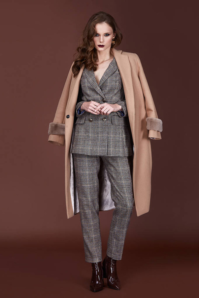 Beautiful sexy woman wear for meeting date business style suit jacket pants cashmere coat accessory fashion collection shoes model pose long brunette hair natural make up businesswoman casual clothes. - Fotoğraf, Görsel
