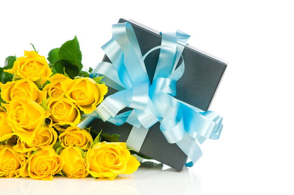 Yellow roses with gift box isolated on white background - 写真・画像