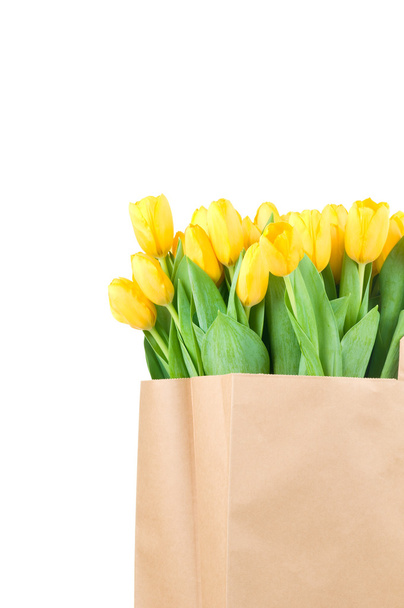 Tulips in the paper bag - Фото, изображение