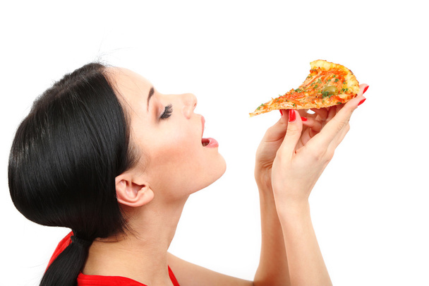 Beautiful girl eats pizza close-up isolated on white - Foto, Bild