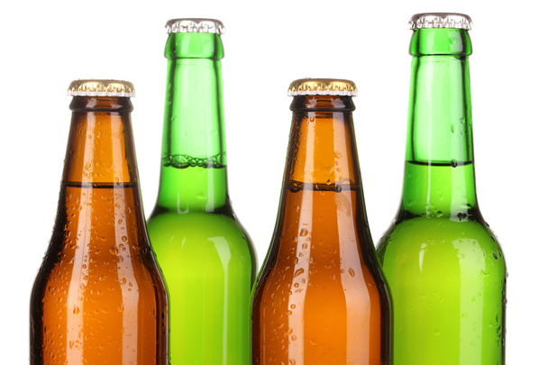 Coloured glass beer bottles isolated on white - Photo, Image