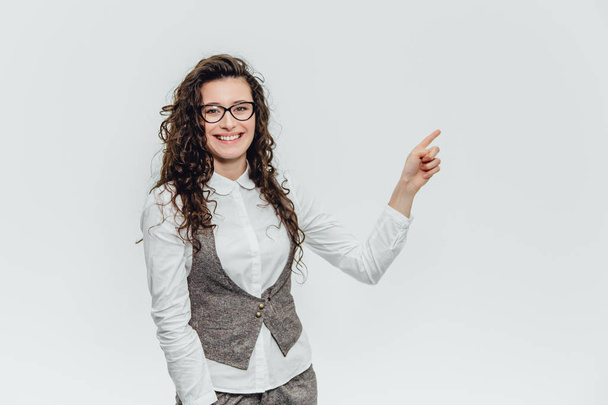 Cute young business girl in suit and glasses. - Fotografie, Obrázek