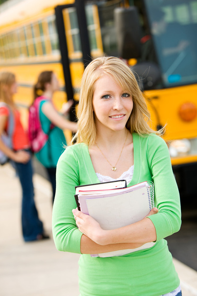 School Bus: Teen Student in Front of Bus - Foto, immagini