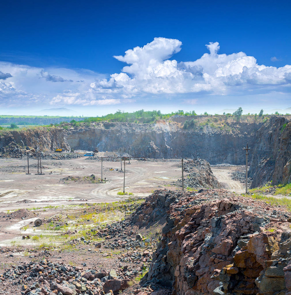 Spectacular panoramic view of quarry open pit mining of granite stone. Process production stone and gravel. Quarry mining equipment. - Foto, Imagen