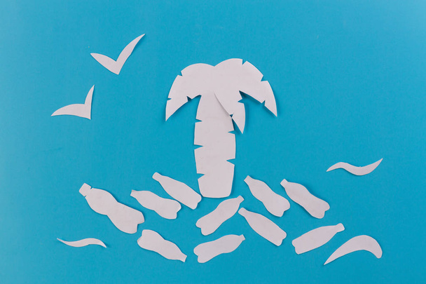 ocean pollution concept. plastic bottles on the beach. paper cut - Valokuva, kuva