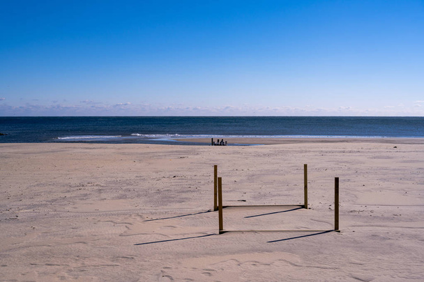 Photo of a deserted Spring Lake, NJ beach on a bitter cold winter morning - Foto, immagini
