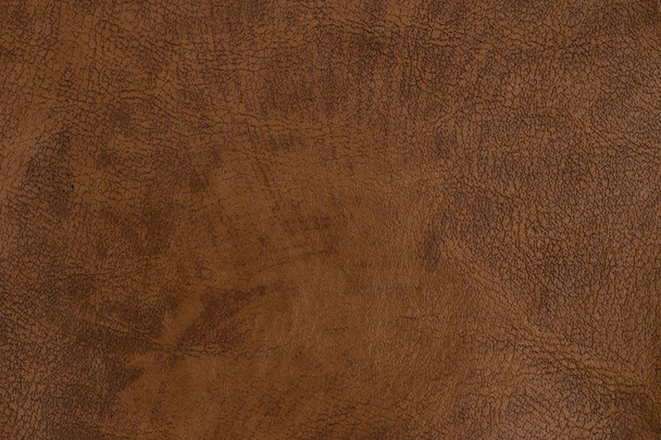 Close-up bruin leder texture op achtergrond. Abstracte leder texture.  - Foto, afbeelding