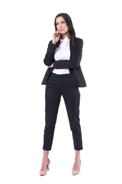 Serious confident business woman watching interested with hand on chin. Attention concept. Full body isolated on white background.  - Φωτογραφία, εικόνα