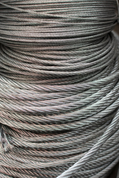 Котушка нової сталевої мотузки - абстрактний промисловий фон
 - Фото, зображення