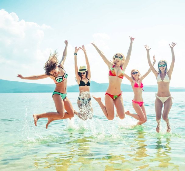 view of Group of Friends Having Fun on Tropical Beach in  summer. summer time - Fotó, kép