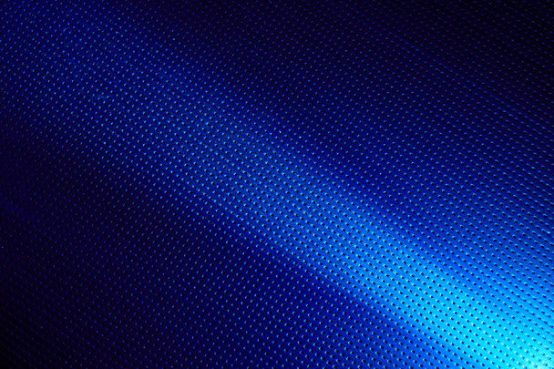 Narrow white ray of light on a blue background in a black dot - Photo, Image