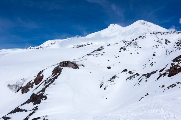 Double peak of Mount Elbrus, the highest mountain in Europe - Fotoğraf, Görsel