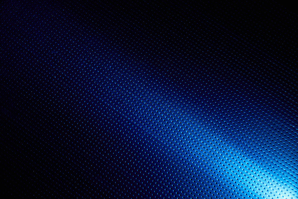 Diagonální jasný paprsek světla na modrém pozadí - Fotografie, Obrázek