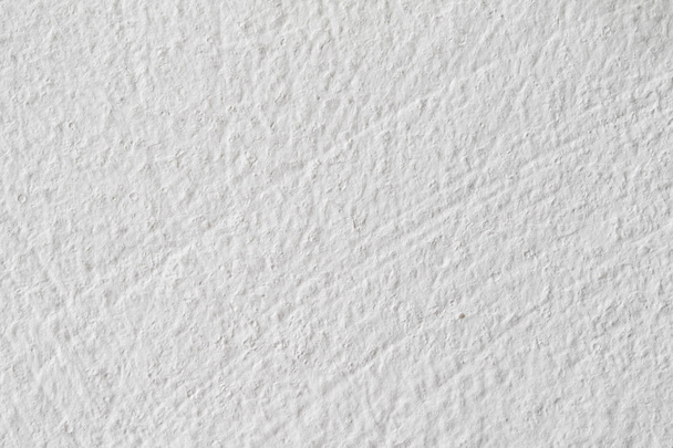 Background texture.White concrete wall. Small cracks on the surface. - Photo, Image
