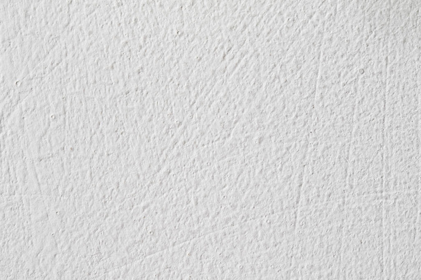 Hintergrund texture.white Betonwand. kleine Risse an der Oberfläche. - Foto, Bild