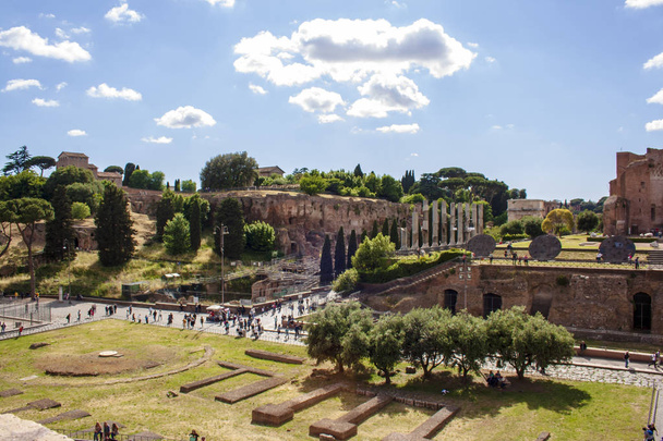Picture of Fori Imperiali ruins. Historical site of roman ancient city. Summer time trip.  - Foto, Imagen