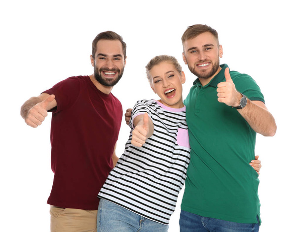 Portrait of young people laughing on white background - Foto, imagen