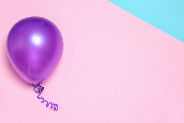 Bright balloon on colorful background, top view with space for text. Party time - 写真・画像